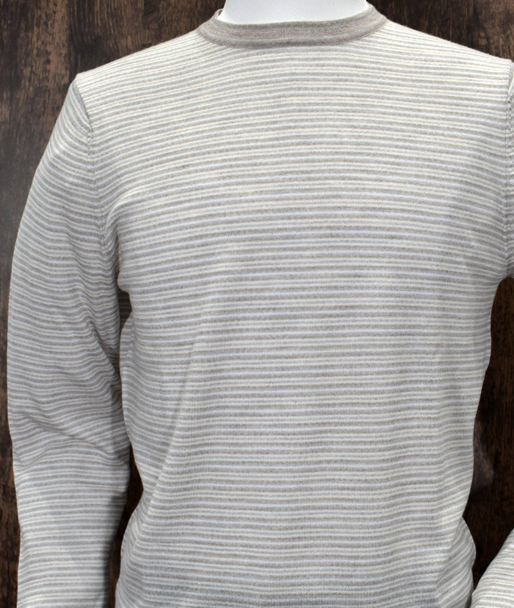 Designed by Assaraf in Italy, this soft multi color stripe is subtle and rich. The exquisitely soft merino wool feels light and fantastic on.