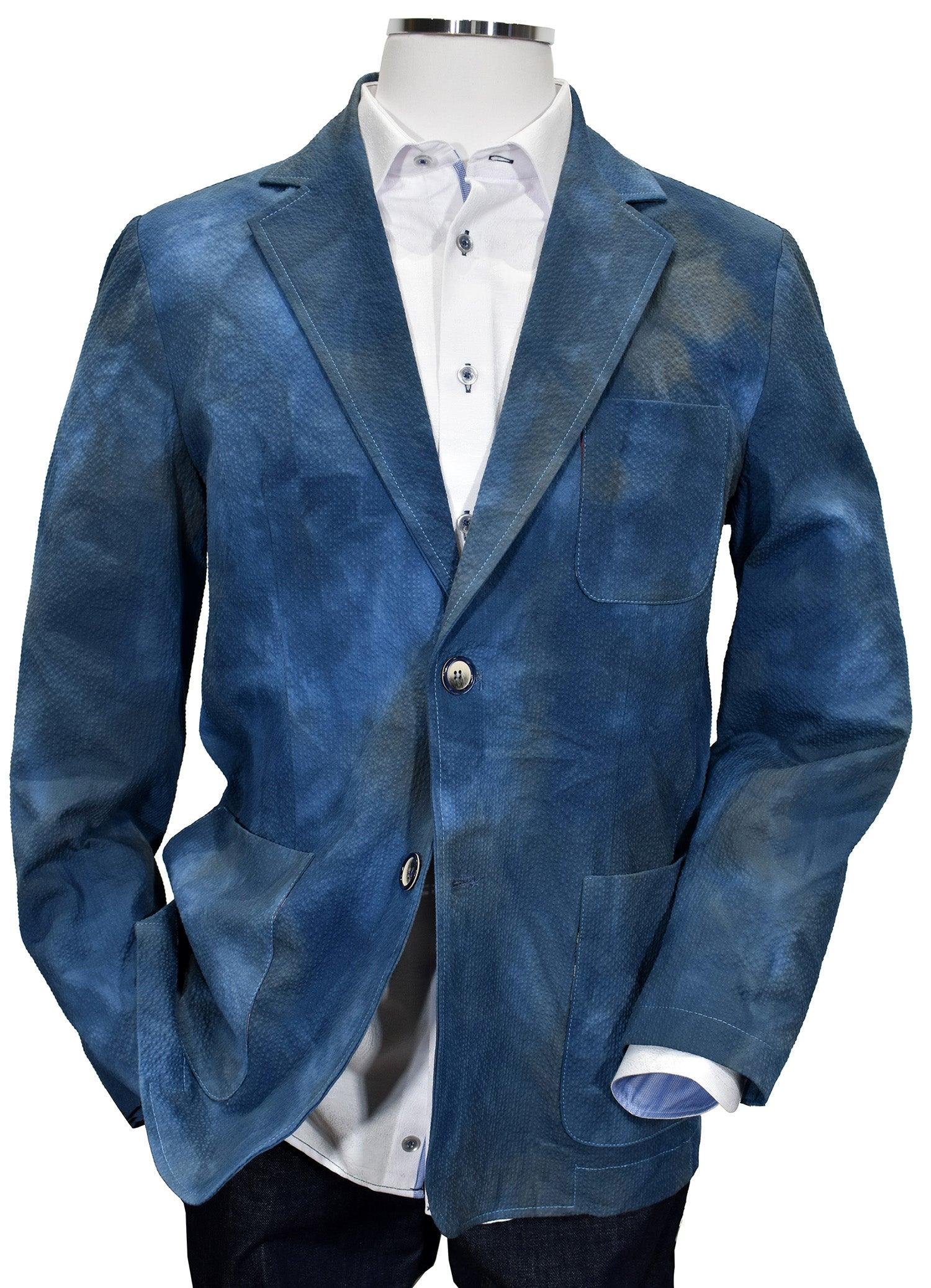 When your image makes a statement, it surely will be when wearing this textured washed and dyed sport coat. Uniquely designed and produced by Graison in Italy featuring a soft shadow seersucker fabric, washed for a distressed, cool image. Graison Graham Inspired Italian Sport Coat Excellent with jeans or pants. Fine textured fabric adds to the image. Nice mix of blue and navy washed colors. Soft coat, should lined. Modern fit, best for a slim to medium build.