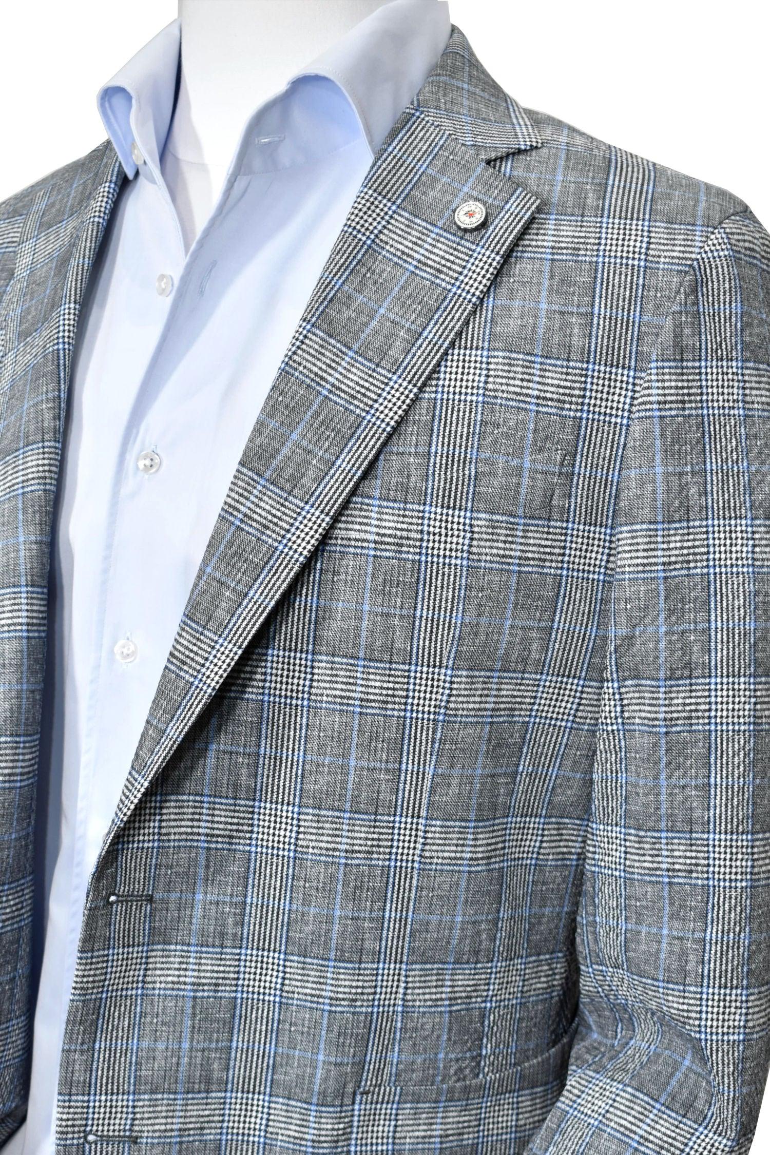 Elevate your casual lifestyle with a poly microfiber sport coat that functions perfectly as a traveler coat while maintaining a dressy look. The coat is very lightweight with no lining to function perfectly during the warmer months of the year. Classic pocket detailing, back side vents, and a soft should for a contemporary look. The soft microfiber fabric doesn’t wrinkle and has a slight texture to add to the look. SLIM FIT, best for a slim to medium build.