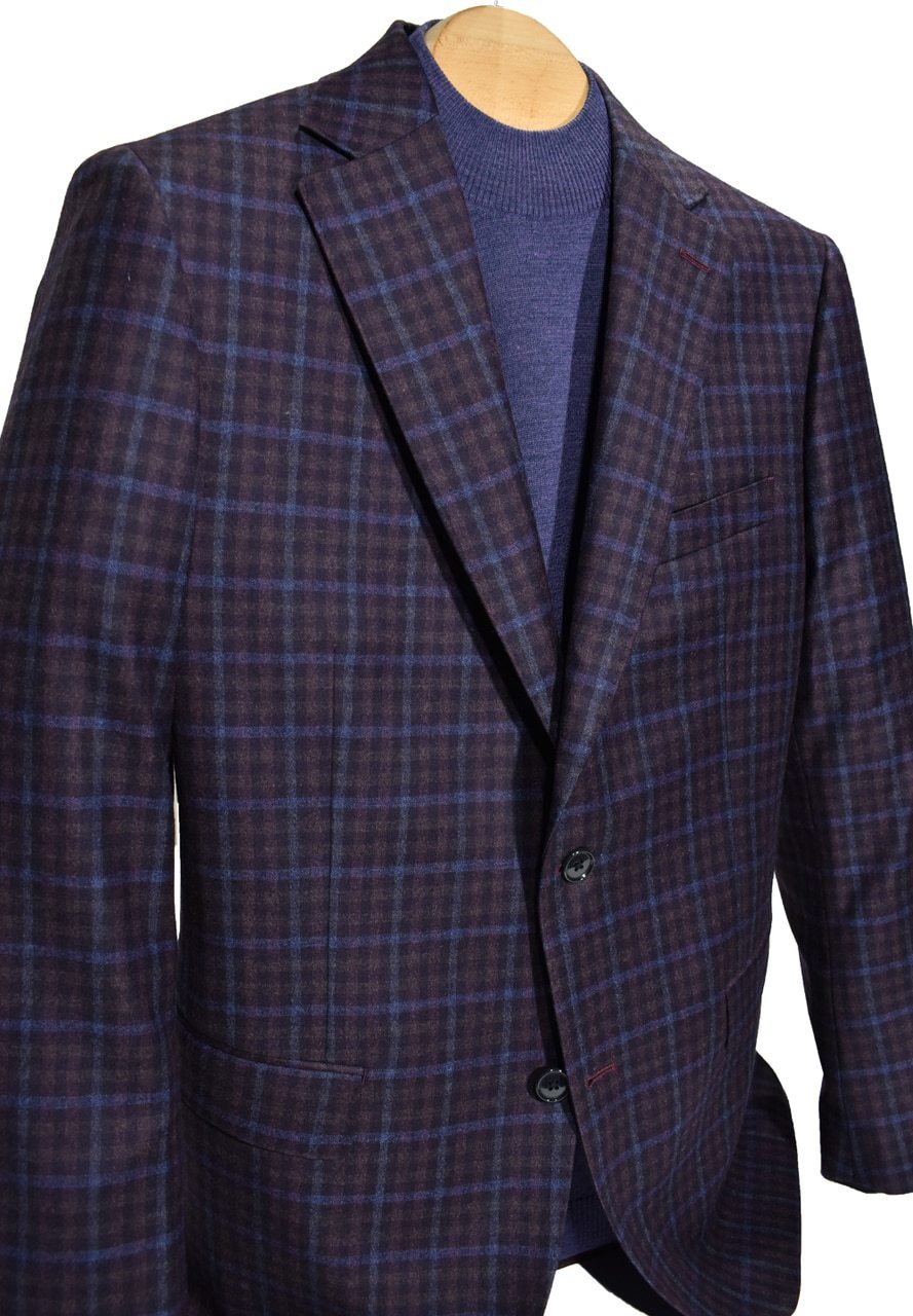 Soft plaid mixing wine, plum and black to create an updated look for the season. Lightweight with a soft hand feel and modern fit.