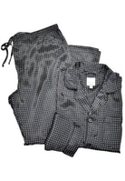 Exquisite black 100% silk pajama exclusively for Justin Harvey. Features an elastic waistband with button closure and drawstring. Full button front top and left chest pocket. Truly the best in pajamas. Classic fit.