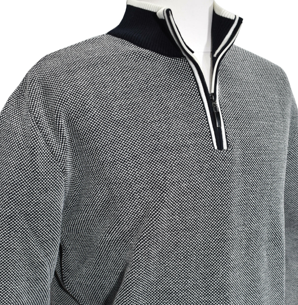 Marcello Quarter Zip  Stay warm and comfortable with the modern style of the 562 Marcello Exclusive Quarter Zip. Crafted with fine two-color yarns knitted together and contrast stitch work, it makes the perfect addition to any wardrobe. Italian merino wool blend ensures a classic style, making it ideal for dress or casual occasions.