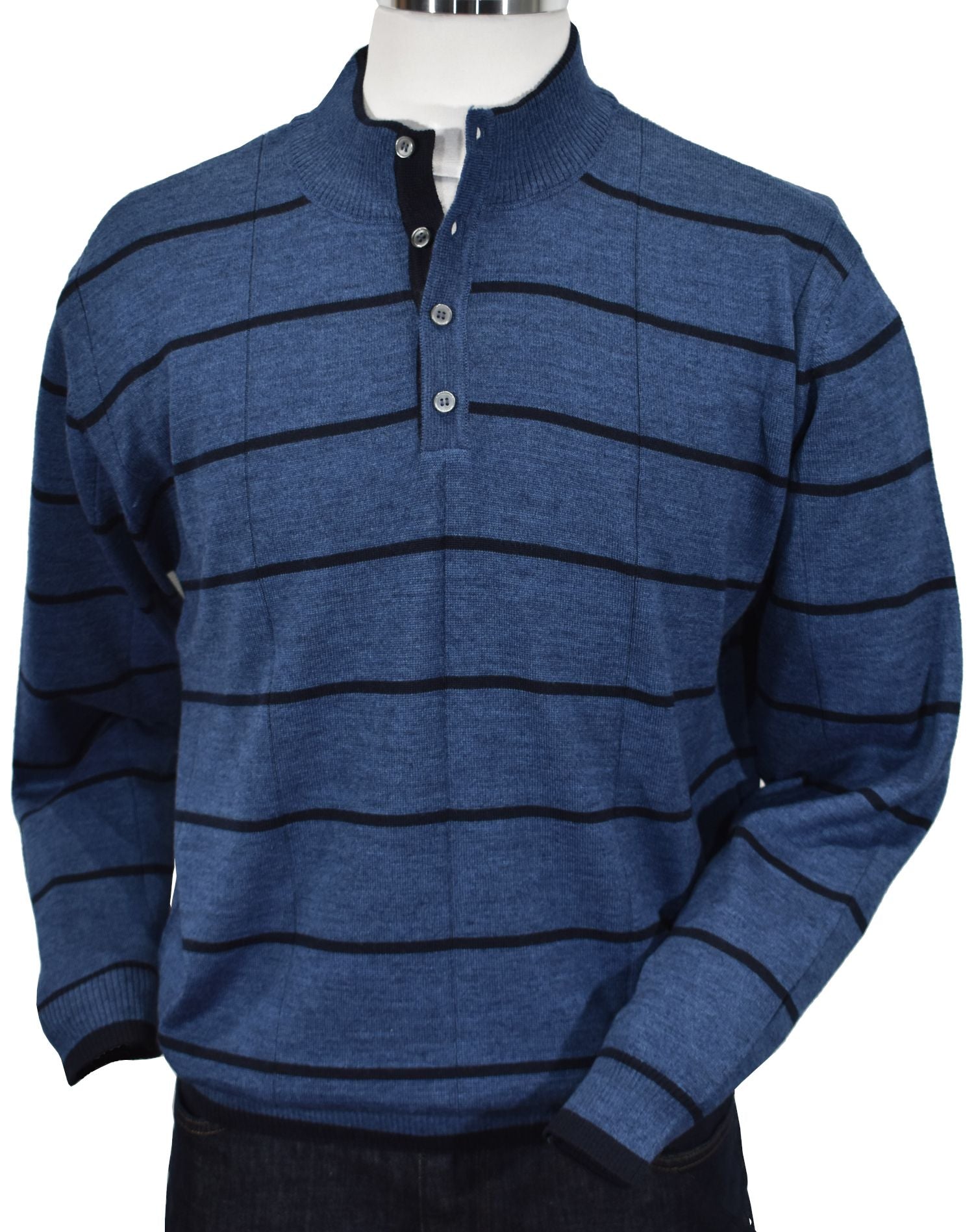 Our Indigo Clarese Classic Knit was crafted with luxury in mind. Indulge in the soft texture of lightweight, washed merino wool blended yarn, and experience the warm image of indigo melange yarns. Vertical jacquard rib stitching and a horizontal accent stripe provide elegance to the classic button mock neck model with a classic fit. 