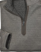 Get the best of both worlds with a Marcello Mocha Reversible Quarter Zip. Featuring a classic mocha finish on one side and stylish chocolate accents on the other, this versatile quarter zip offers two looks in one. Complete with welted fashion seams and a tubular finish, it's the perfect addition to your wardrobe.