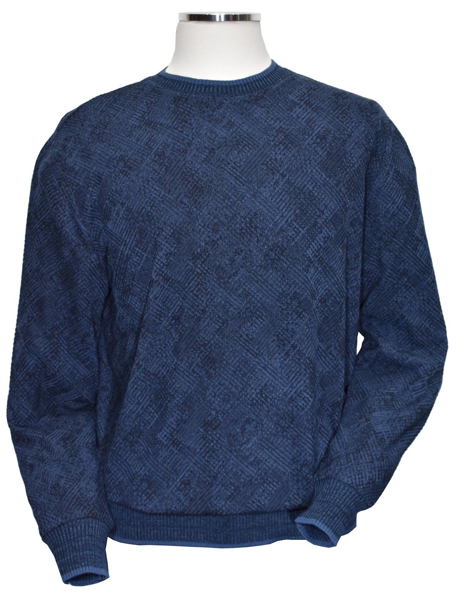 Image style in the Marcello Indigo Diagonal Jacquard Sweater - a perfect blend of cotton, viscose, and microfiber that creates a lightweight, soft knit for ultimate comfort and stretch. Its sophisticated indigo and navy tones and shaded highlights, along with a stylish abstract diagonal pattern, will elevate any outfit. A clean and stylish image to pair with jeans or pants.