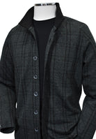 Introducing the Marcello Vince Sport Button Shacket. Enjoy the masterful combination of style and functionality in a shacket. This shirt jacket features a classic mock collar and button enclosure, along with open sleeve cuffs and a open waist band for a comfortable fit. The warm charcoal base color is accented with a black plaid pattern and a pop of emerald tones.