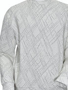 The Marcello Italian inspired Fractured Diagonals Pullover is a unique and stylish addition to your wardrobe. Made with a soft and lightweight blend of cotton, viscose, and microfiber, this pullover features a fine horizontal rib design in winter white and a fractured diagonal jacquard pattern in black. With its expert craftsmanship, it is sure to garner compliments wherever you go.