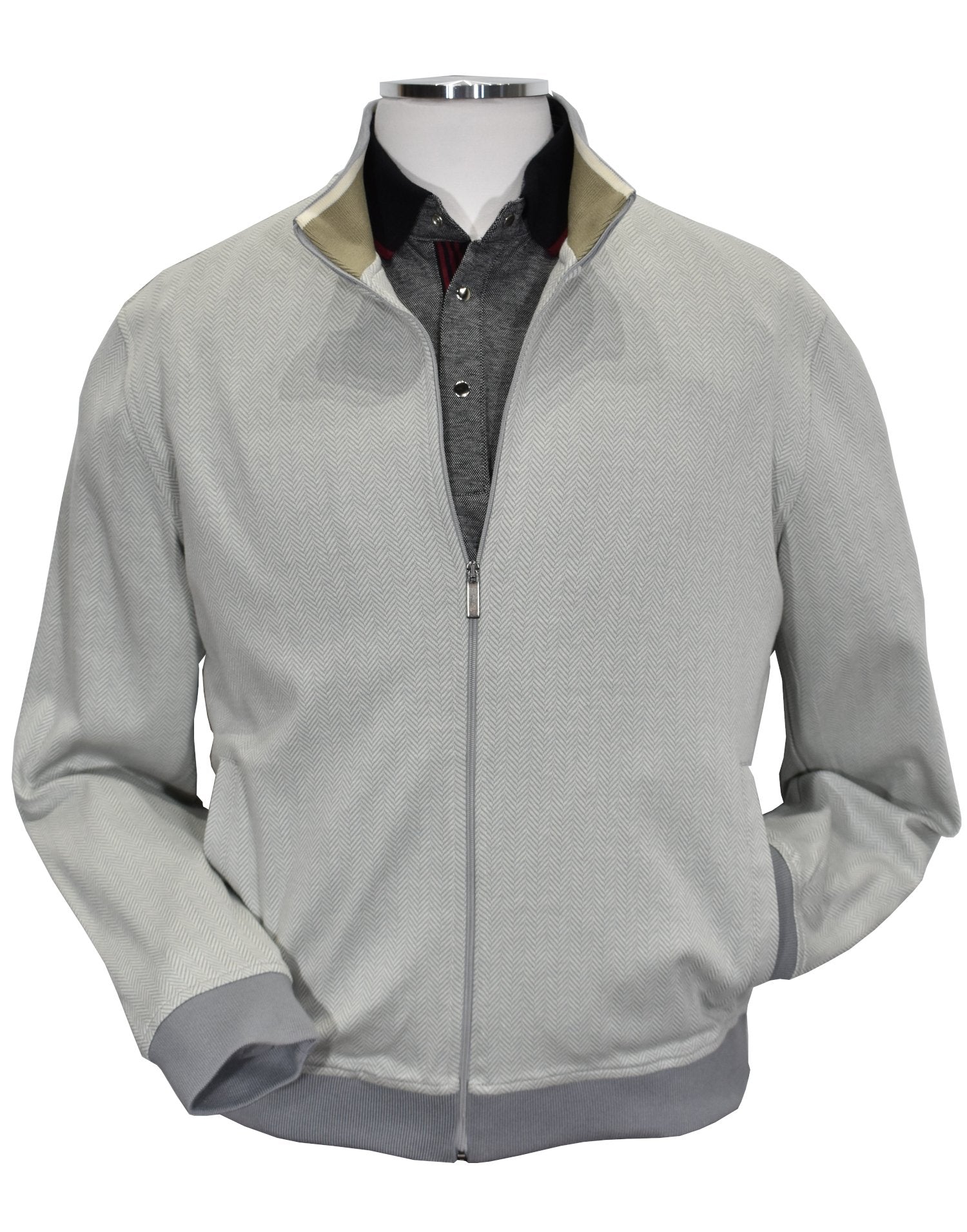 Elevate your style with the exclusive Marcello Tempe Style Bomber Jacket. The rich herringbone pattern in soft gray and ivory gives a sophisticated touch, while the lightweight fabric made of cotton and microfiber offers comfort. Make a statement with this dressy and versatile jacket.