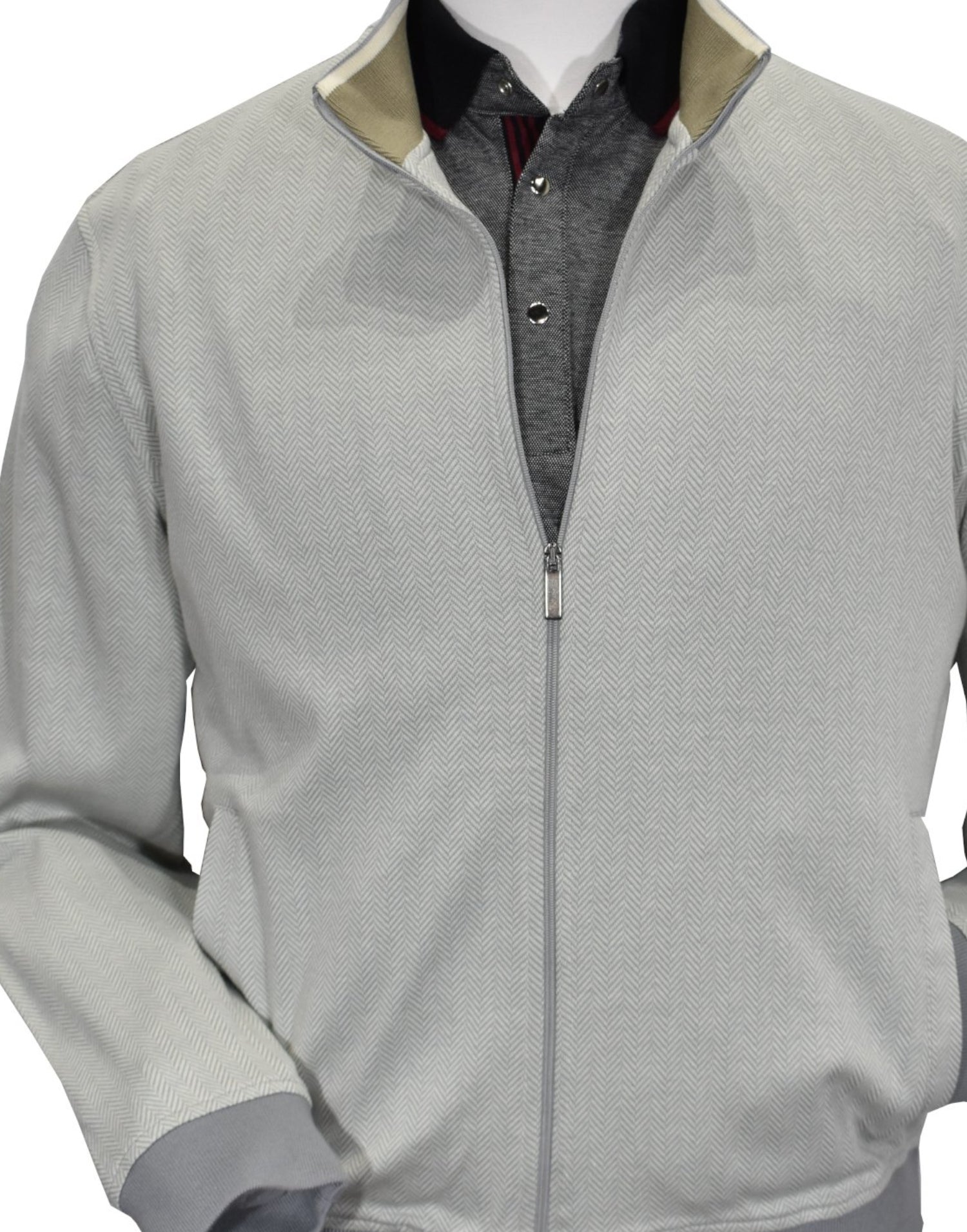 Elevate your style with the exclusive Marcello Tempe Style Bomber Jacket. The rich herringbone pattern in soft gray and ivory gives a sophisticated touch, while the lightweight fabric made of cotton and microfiber offers comfort. Make a statement with this dressy and versatile jacket.