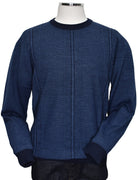 This Marcello 910 Uomo Milano Sweater features a rich indigo color with navy accents, perfect for a sophisticated yet modern look. Made in Italy with fine yarns, it boasts a unique vertical jacquard pattern and rib effect. Elevate your wardrobe with this luxurious and stylish piece.