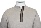 Elevate your style and comfort with Marcello's 911 Valley Mock in a warm wheat color. Made with a soft Italian merino wool blend, this lightweight sweater features a covered button mock neck and trendy chocolate accent colors. The vertical shoulder jacquard stitching adds a touch of sportiness to the look.