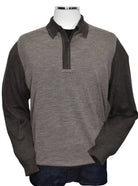 Upgrade your wardrobe with Marcello's 913 Amalfi Collection Mocha Polo. Designed by our Unica Milano team, this Italian-made polo is made from a luxurious merino wool blend that is lightweight, soft, and sophisticated. The covered zip polo model features a fine dashed effect for a touch of timeless style. Elevate your fashion game with this classic piece.