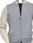 Upgrade your wardrobe with Marcello's 915 Amalfi Collection 2 way zip cardigan. Designed by our Unica Milano team, this Italian-made full zip cardigan is made from a luxurious merino wool blend that is lightweight, soft, and sophisticated. The engineered model features a contrast effect for a touch of timeless style. Elevate your fashion game with this classic piece.