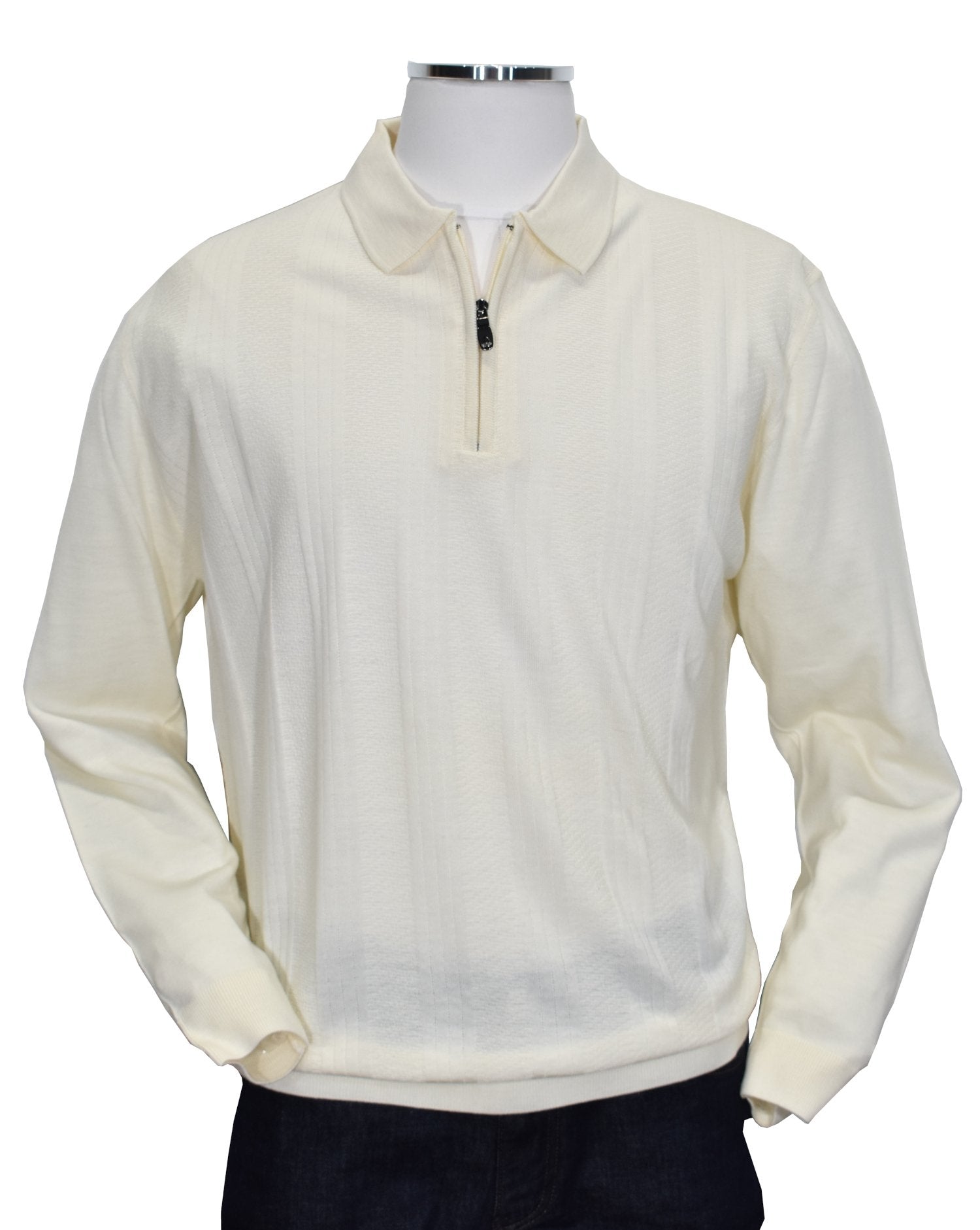 The Marcello 919 Madison Tonal Knit is the perfect addition to your winter wardrobe. Crafted in a crisp ecru solid jacquard, this lightweight zip polo is both soft and versatile. Pair it with any bottoms for a stylish winter white look, or layer it under a sport coat for a sophisticated touch.