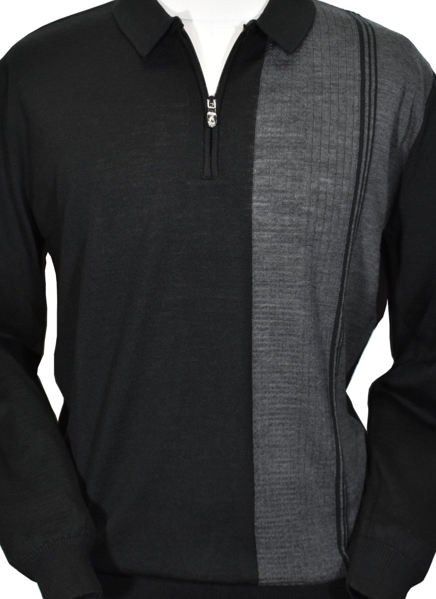 Upgrade your wardrobe with the Marcello 923 Verasano Sport Knit. Featuring a cool black zip polo with a unique vertical charcoal panel, this long sleeve polo will elevate your style. From retro to contemporary, it's versatile and stylish for any occasion.