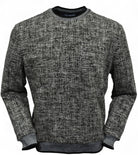 This classic crew neck sweater features a rich combination of tan, ivory, and black, making it the perfect addition to any outfit in the black or tan families. 