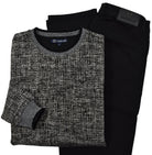 This classic crew neck sweater features a rich combination of tan, ivory, and black, making it the perfect addition to any outfit in the black or tan families. 