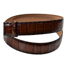A Marcello Mocha Brown crocodile-embossed leather belt with a silver-tone metal buckle, coiled on a plain white background.