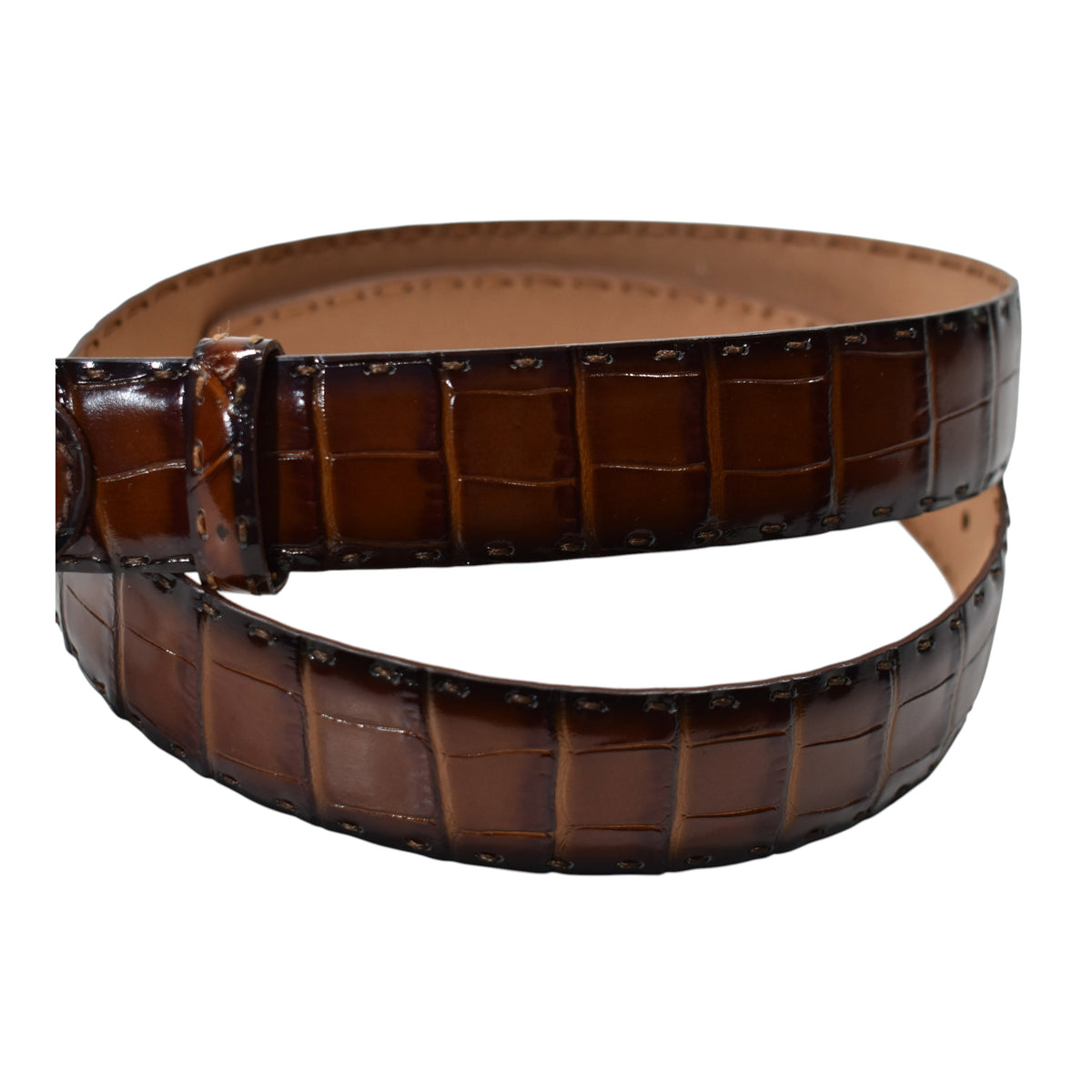 A Marcello Mocha Brown crocodile-embossed leather belt with a silver-tone metal buckle, coiled on a plain white background.
