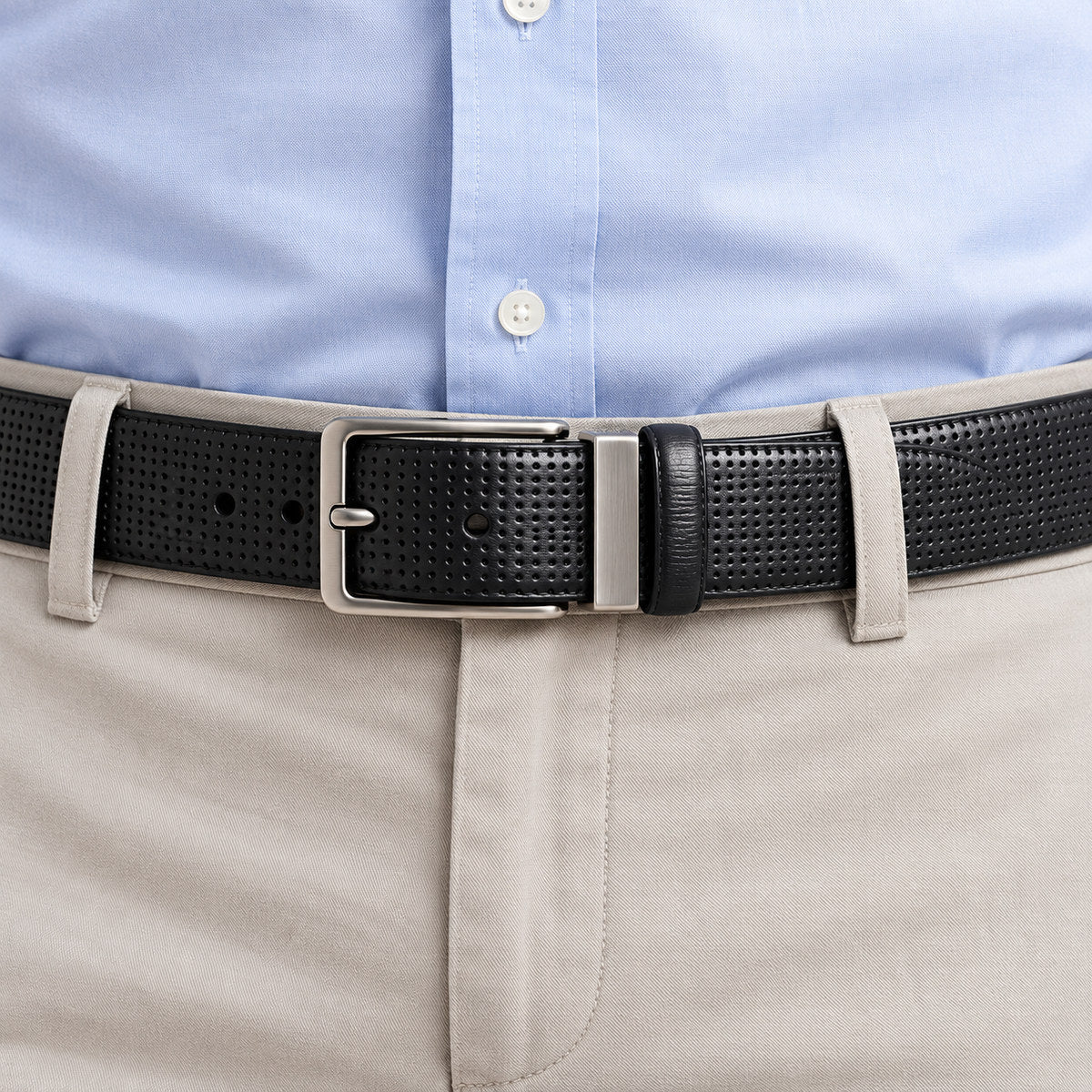 Finely perforated belt, extra fine leather for a classic, yet updated style. Black or Chocolate.  By Marcello Sport.  Finely perforated fashion pattern. Excellent with your favorite jeans or pants. Black or Chocolate. Satin Nickel Finished Buckle. Slightly wider to provide a better jeans image. Premium leather. Sizes 32-44.