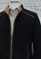 The J101 Vanderbilt is a classic-fit exclusive suede jacket, crafted from luxuriously soft suede and punctuated with contrast leather trims for an elegant, tasteful finish. Perfect for the sophisticated dresser, this timeless piece features detailed stitchwork along the neck band, zipper, shoulders and pockets for a distinguished look. Adjustable cuffs and an open bottom complete the Look. Black/Cognac is the perfect color palette for classic style.