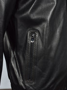 Experience the luxury of the Marcello Redondo Leather Coat.