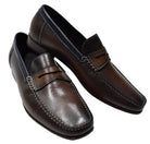 Marcello S127 Chocolate Dress Sport Shoe brings a touch of modern sophistication to any look. The burnished leather shoe in rich chocolate with tan accents is perfect for formal and casual wear, providing a timeless style with a hint of flair. Handcrafted in Spain and designed with a classic fit, this shoe is sure to become a wardrobe staple.