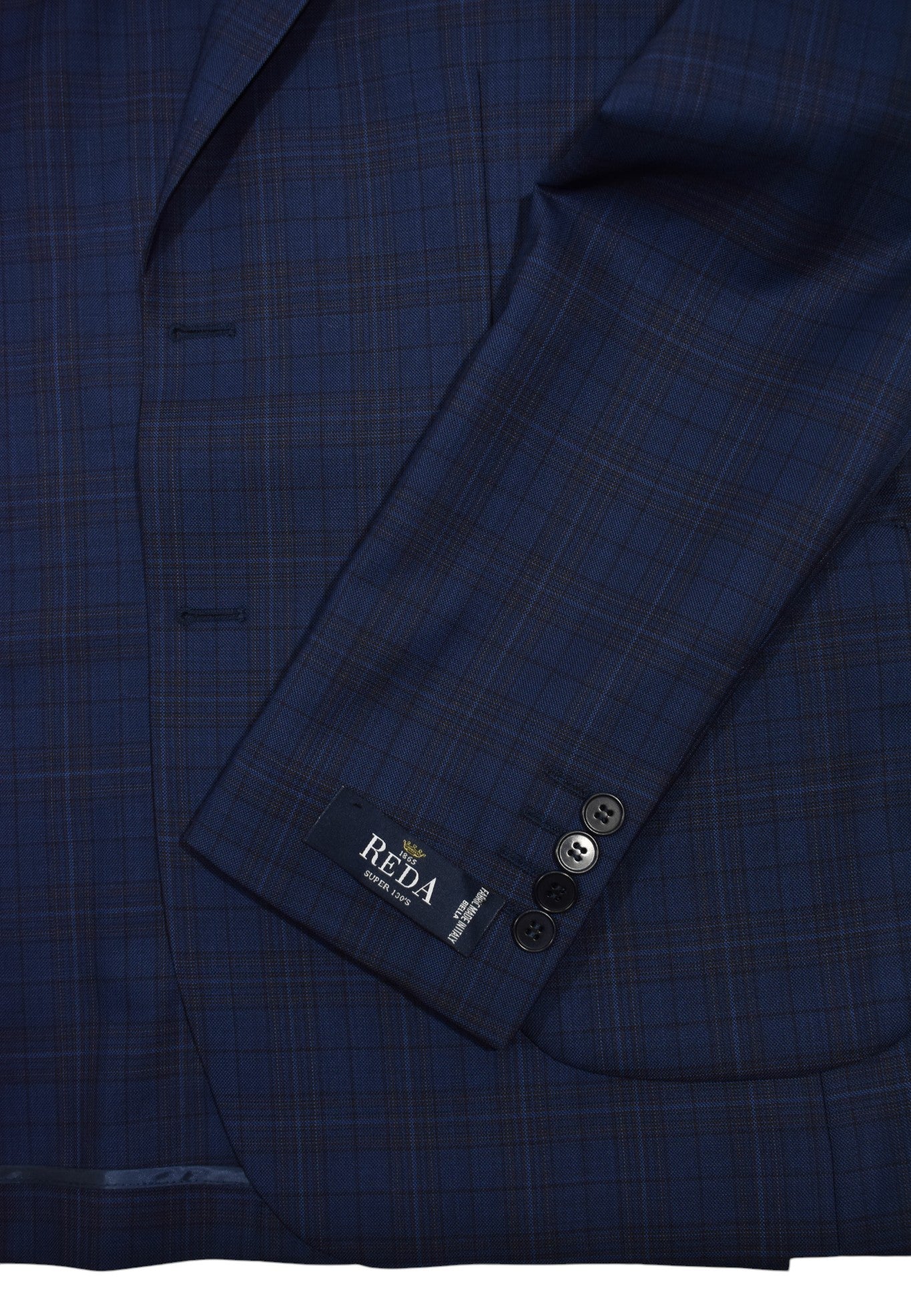 Navy plaid sport coat by Marcello.