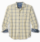 Yellow plaid shirt with rolled-up sleeves on a white background