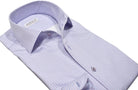 Upgrade your wardrobe with the W028R Plum Stream Roll Collar. Crafted from extra fine cotton with a luxurious silk-like finish, this shirt is a dream to wear. The Marcello exclusive one-piece roll collar stands elegantly, while the custom matched buttons and trim fabric add a touch of sophistication. 