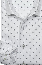 Upgrade your wardrobe with the W038R Lost Paisley Roll Collar. Crafted from extra fine cotton with a luxurious silk-like finish, this shirt is a dream to wear. The Marcello exclusive one-piece roll collar stands elegantly, while the custom matched buttons and trim fabric add a touch of sophistication.