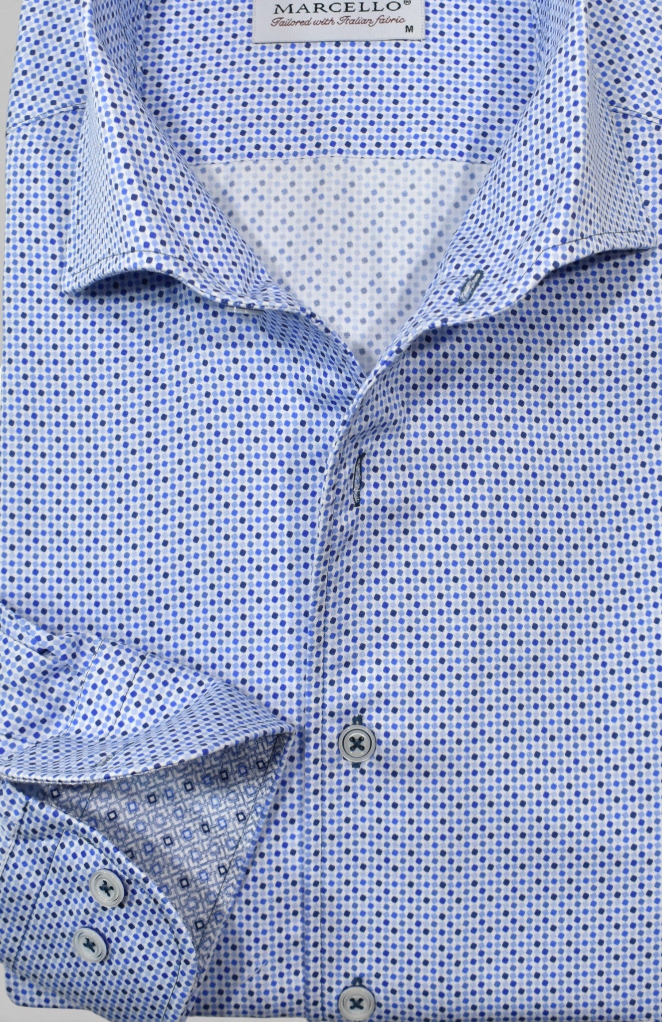 Marcello Delray blue dotted shirt.