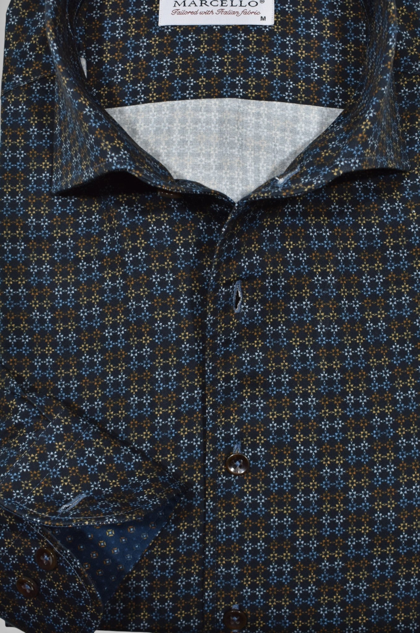 Marcello color linked boxes on a black shirt.