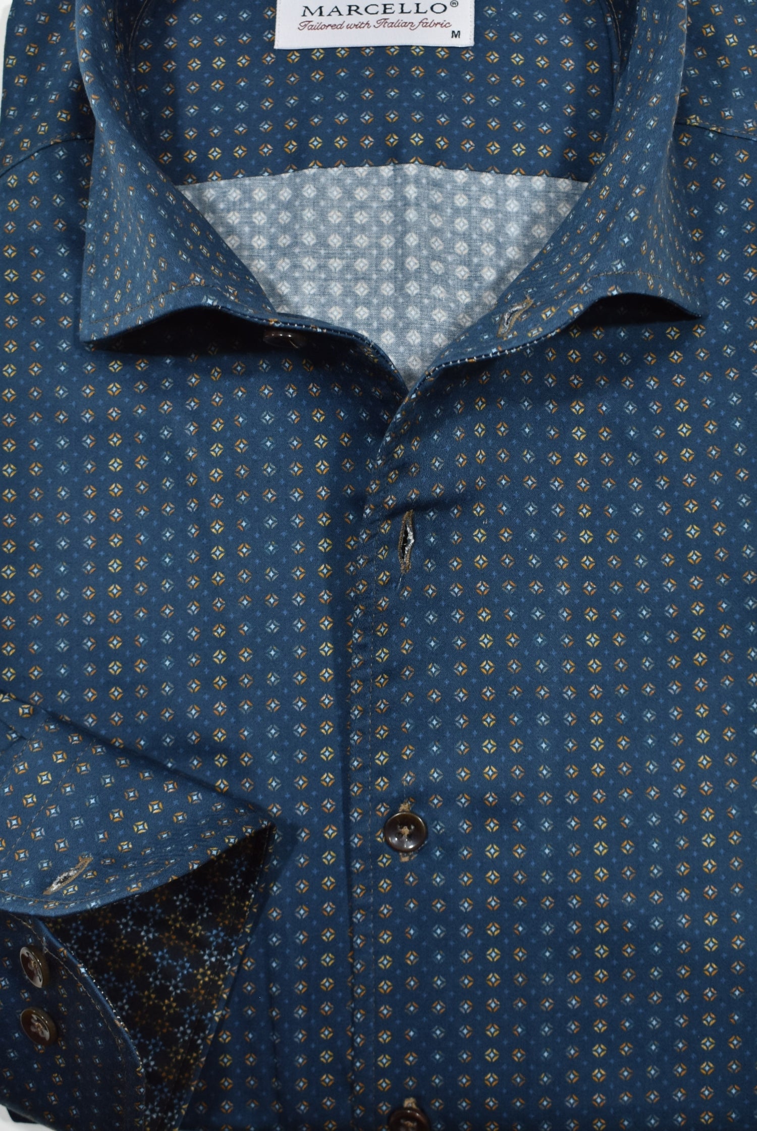 Marcello navy with small colored medallions shirt.