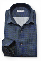 Navy Marcello shirt with round medallions.