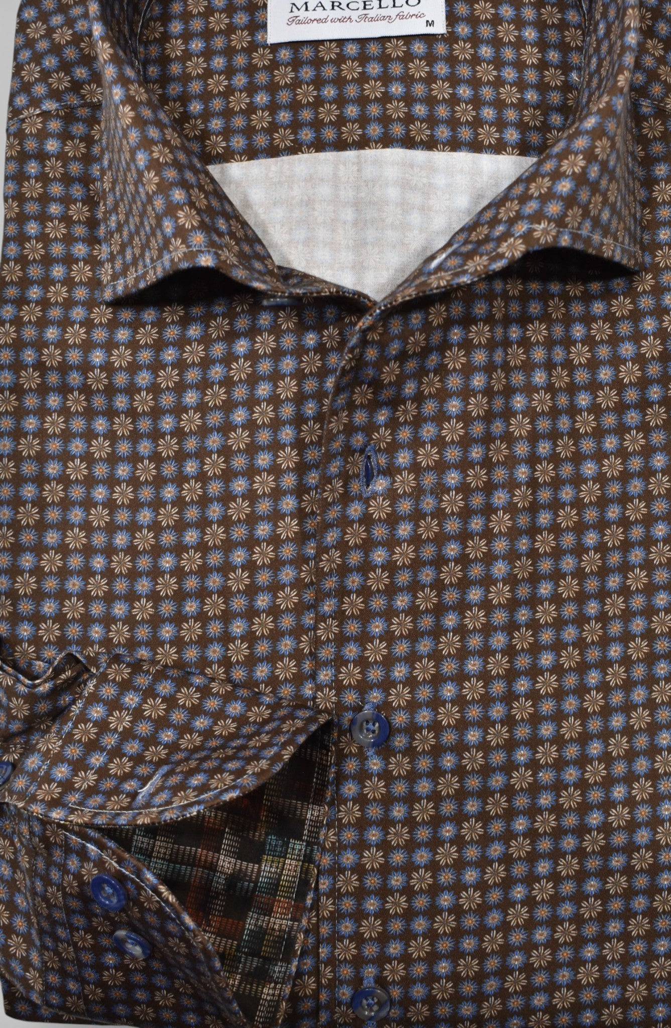 Marcello chocolate shirts with tan and blue medallions.