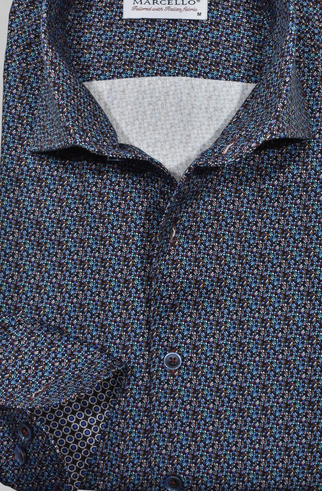 Marcello emerald and teal wave pattern shirt.