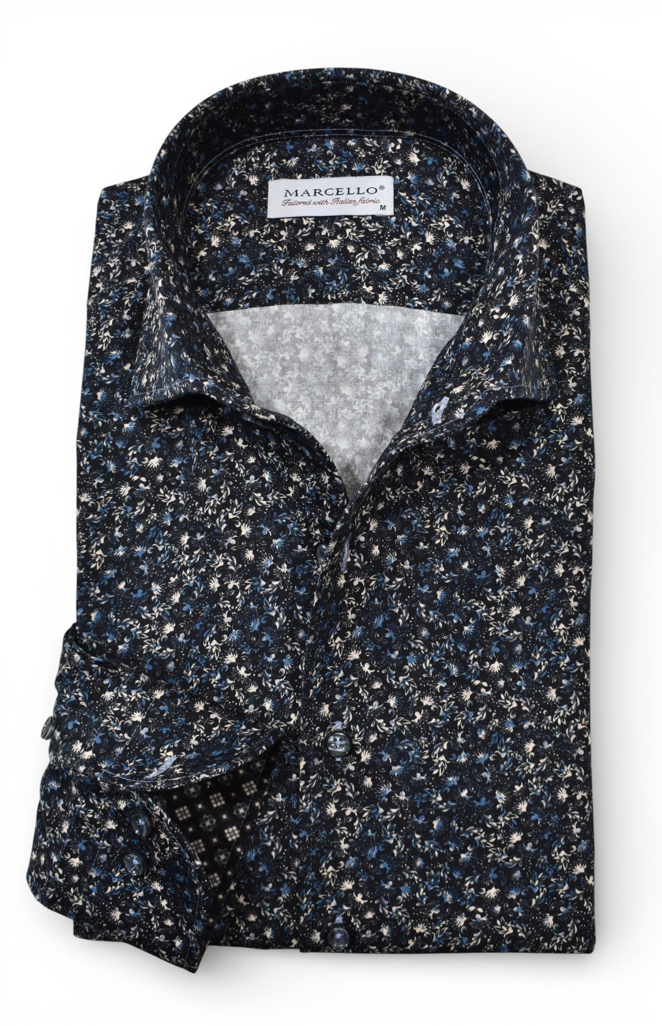 Marcello black floral with accent colors in tan and blue.