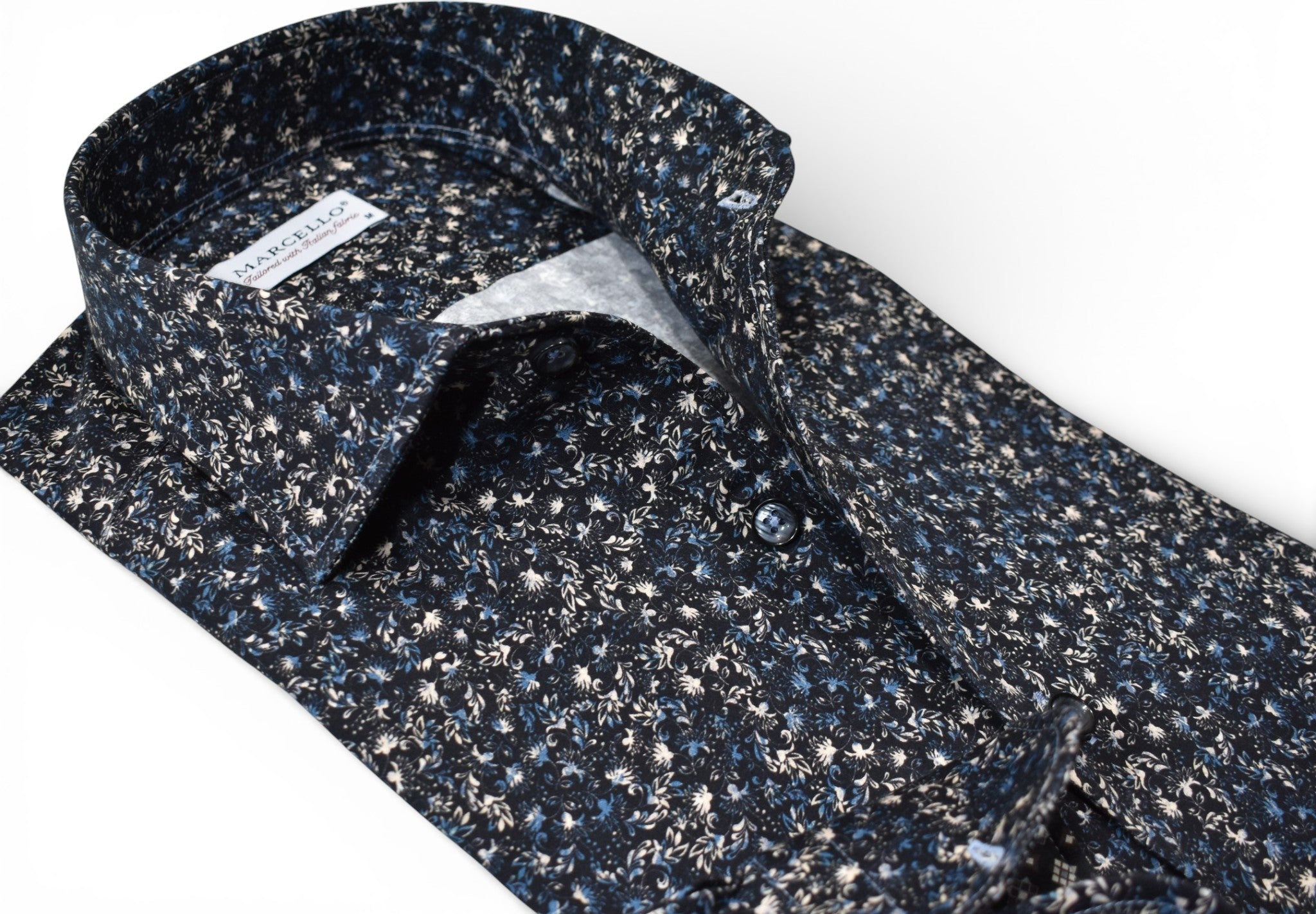Marcello black floral with accent colors in tan and blue.