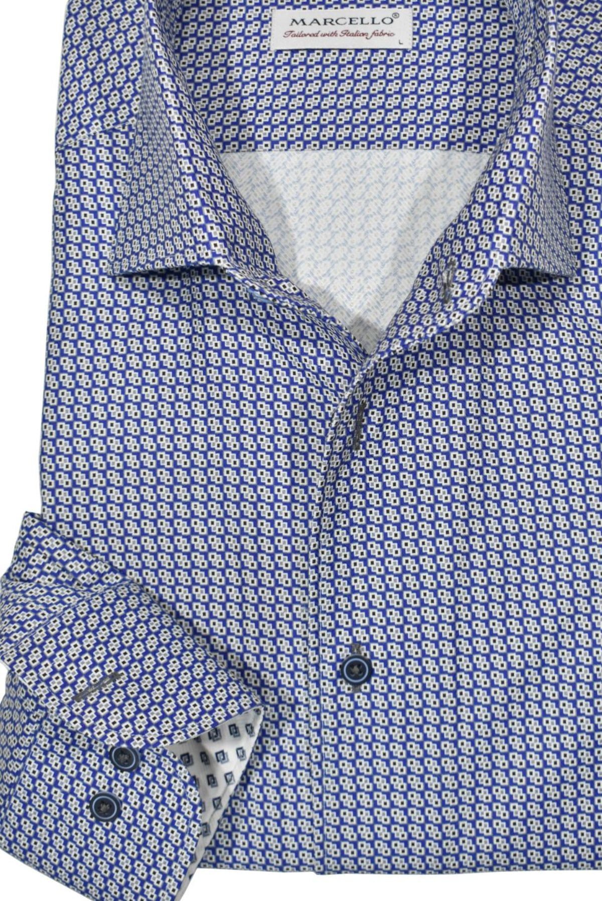 The distinguished Marcello one-piece roll collar is remarkable. It has a distinct standing shape that will draw attention. This shirt is perfect due to its versatile color selection, as well as its stylish micro geometric pattern. The sleeves are adorned with complementary trim fabric and custom buttons. Additionally, the soft cotton fabric provides a timeless fit.