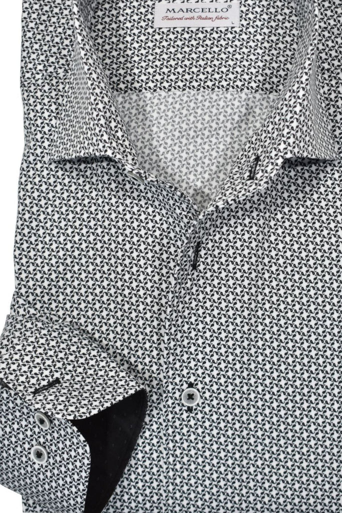 If you are yet to experience Marcello's one-piece rolled collar, you are missing out on a tremendous opportunity. The chic style, precise collar, luxurious cotton fabric, and eye-catching black and white hounds tooth pattern come together to create a timelessly sharp look. A classic silhouette that fits just right.