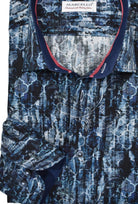 Enhance your wardrobe with this abstract printed shirt featuring a hues of warm indigo and navy. The luxuriously soft cotton composition, paired with matching trim fabric and accent red neck taping, infuses extra flair. The iconic design boasts a mix of geometric shapes and floating paisleys. Additional details include matched buttons and a classic shaped silhouette.