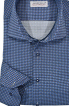 Mixed shades of blue and gray make this medallion an ideal pick for any look—dressy or casual. Its classic, neat pattern exudes classic style, while luxe cotton and a hint of lycra make it soft and stretchy for comfort. Navy taping adorns the neck and button placket, with custom matched buttons completing the look.