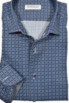 Elevate your style with the Marcello Northport Shaded Medallion shirt. The exclusive one piece roll collar adds a unique touch, while the navy and gray medallion design gives a modern twist to a classic look. Perfect for wearing on its own or under a sport coat, this shirt is sure to make a statement.