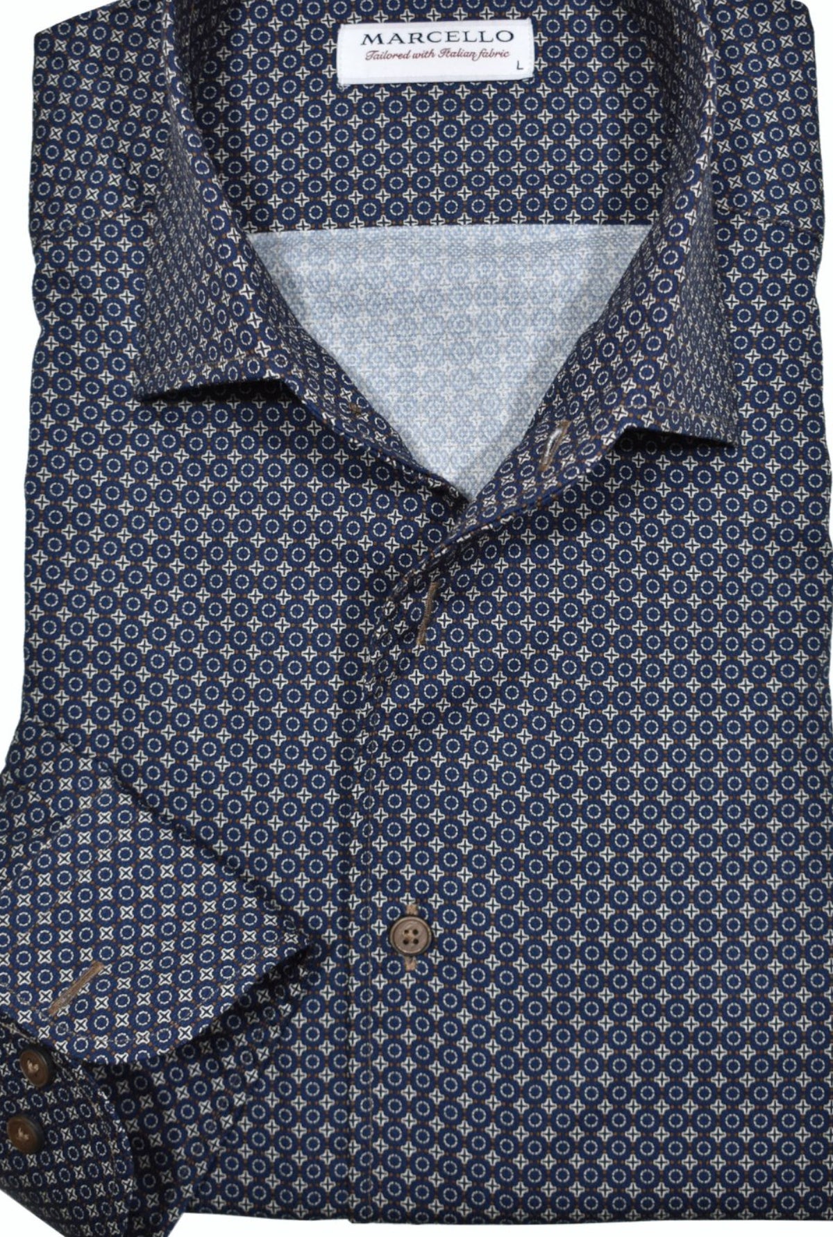 Upgrade your wardrobe with the rich Venice Elegance shirt. The Marcello exclusive one piece roll collar pairs seamlessly with a true navy shirt, highlighted with camel and chocolate neat medallions. Perfect for a stylish and versatile Fall look.