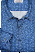 The Marcello Pacific Blue Shirt is made from soft cotton sateen fabric, creating a smooth and comfortable feel. Its abstract pattern evokes the calming depths of the ocean. Double track stitching and custom buttons add a touch of elegance, while the hidden button down collar adds a polished look