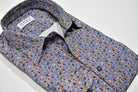 Get ready to make a statement with the Marcello W928 Primetime Paisley shirt. Crafted with rich orange and blue paisleys, this shirt boasts a vibrant style that is perfect for any occasion. The mini paisley pattern adds a unique touch, while the fine blue stripe and accent colors add a touch of sophistication. Don't be afraid to stand out with this cool and not-so-bold shirt.