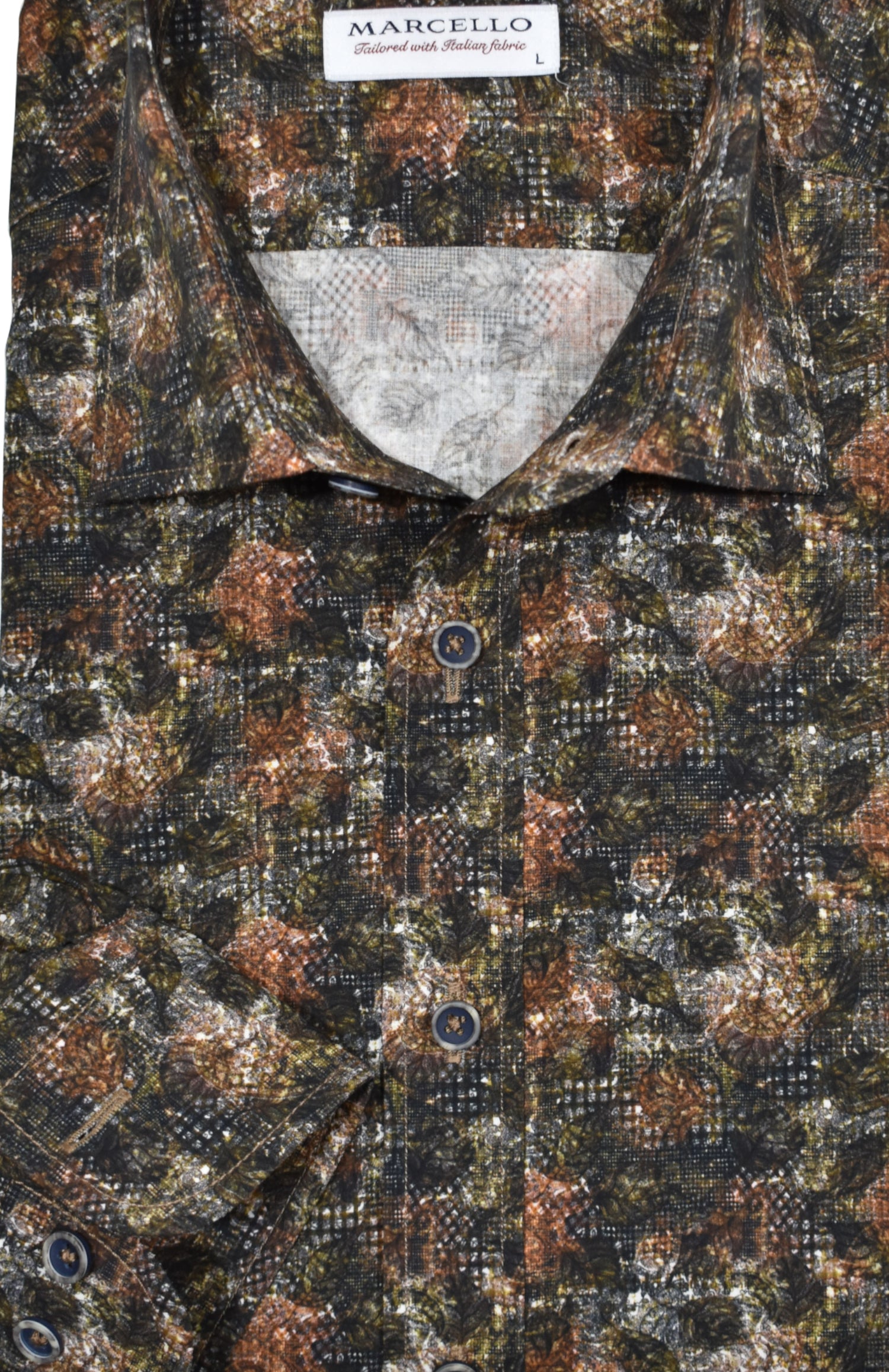 Indulge your senses with Marcello's Mochachino Abstract sport shirt! Featuring warm earth tones of mocha, chocolate, and tan, this versatile piece pairs perfectly with tan or chocolate bottoms for any occasion. Elevate your fashion game with this must-have addition to your wardrobe!