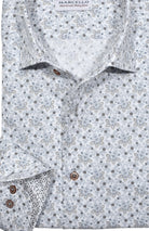 The Marcello Slate Paisley Roll Collar is contemporary and cool with its open paisley pattern in soft slate and mocha accent colors.