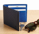 Marcello navy pebble leather billfold.